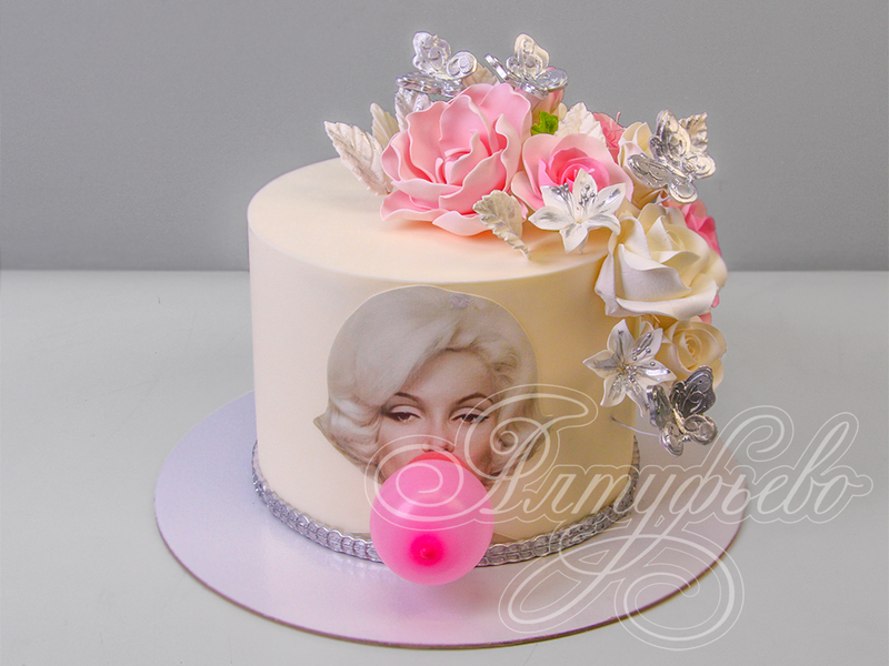 Торт для женщин с блондинкой надувающей жвачку одноярусный с мастикой