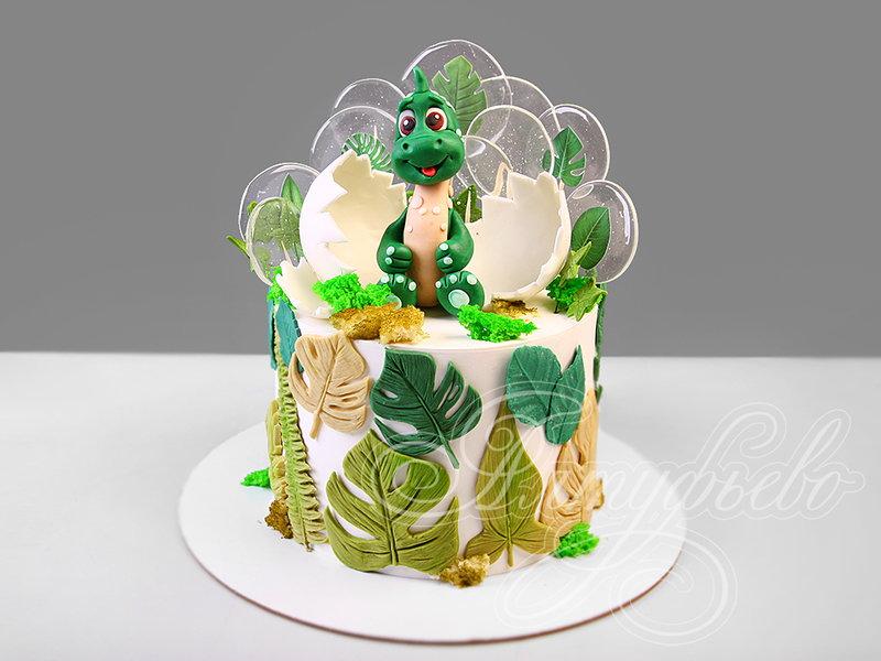 Детский торт самым маленьким с мастикой и фигуркой зеленого динозаврика