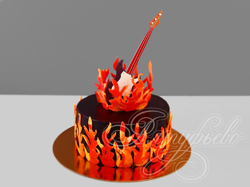 Торт для мужчин черный с пламенем и фигуркой гитары