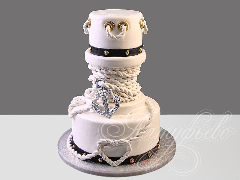 Торт трехъярусный морской на свадьбу с сердечком из каната и якорем