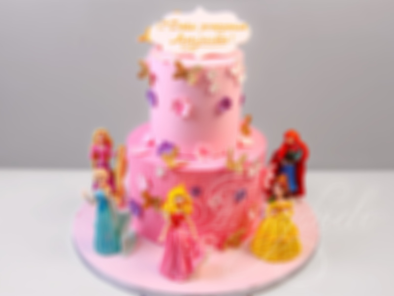 Детский торт с фигурками Рапунцель и другими принцессами двухъярусный розовый