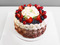 Торт с розочками и ягодами
