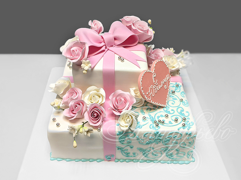 Торт Подарочная коробка с бантом и цветами на юбилей двухъярусный с мастикой